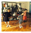 The children are passionately learning how to dance with teacher Hoang Yen