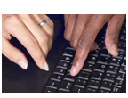 hands on a keyboard
